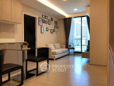 Modern living room with stylish decor and city view from large window