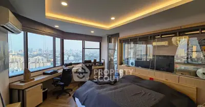 Luxurious bedroom with panoramic city views and modern workspace