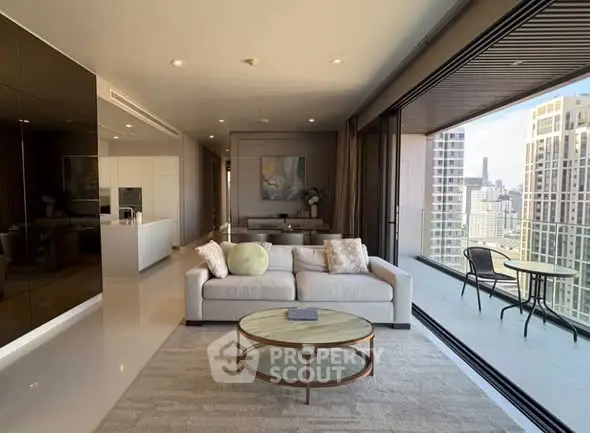 Luxurious living room with stunning city view and spacious balcony in modern high-rise apartment.