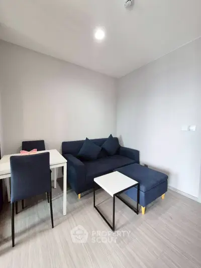 Modern living room with sleek furniture and minimalist design