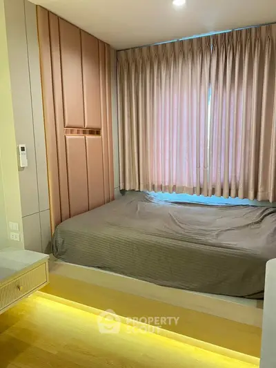 Modern bedroom with stylish paneling and cozy ambiance