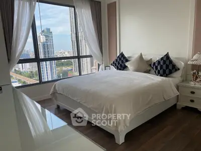 Luxurious bedroom with stunning city view and elegant decor