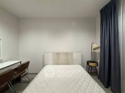 Minimalist bedroom with modern furniture and natural light