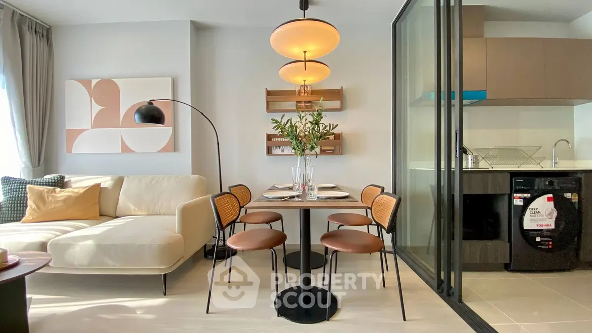 Modern living room with stylish dining area and open kitchen layout