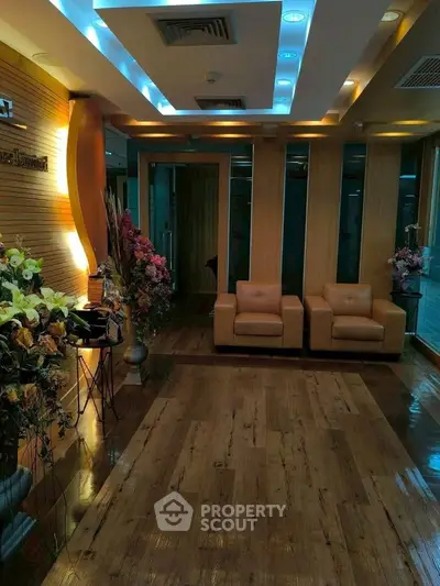 Luxurious lobby with elegant seating and floral decor, perfect for welcoming guests.