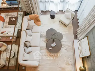 Luxurious modern living room with elegant furniture and natural light