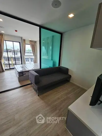 Modern studio apartment with balcony and stylish interior design