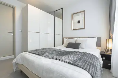 Modern bedroom with stylish decor and cozy ambiance