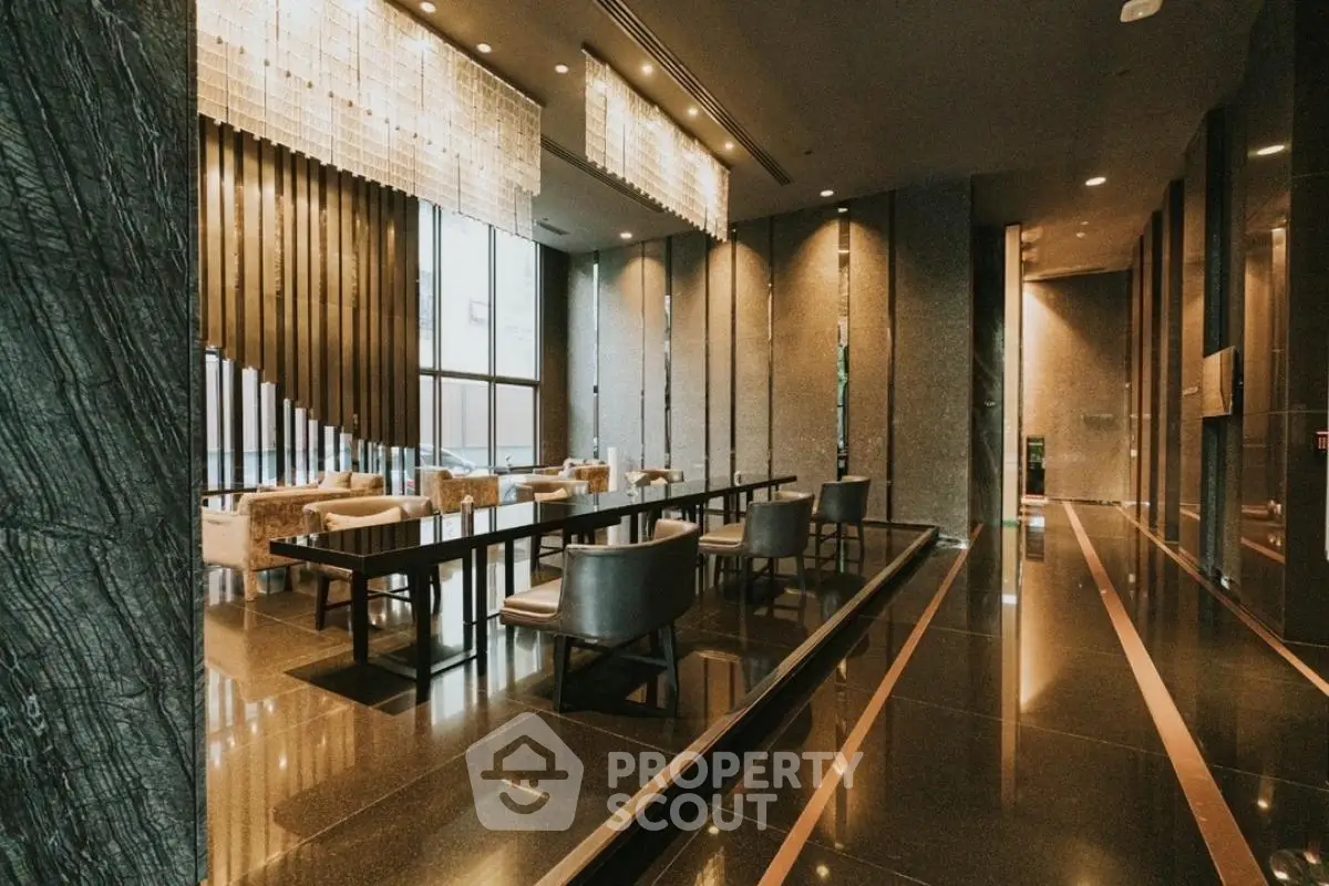 Luxurious modern lobby with elegant seating and grand lighting fixtures