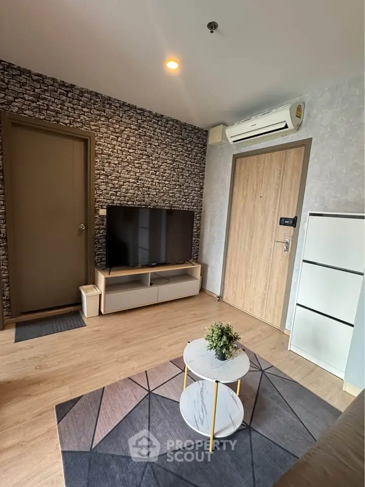 Modern living room with stylish decor and air conditioning