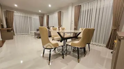 Spacious modern living room with elegant dining area and stylish decor