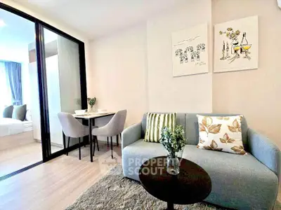 Modern living room with cozy sofa and dining area in stylish apartment