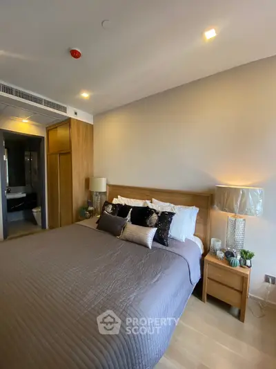 Modern bedroom with stylish decor and cozy ambiance