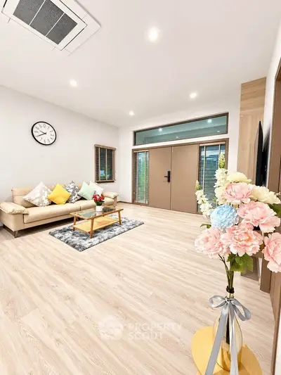 Spacious modern living room with elegant decor and natural light
