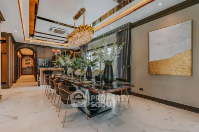 Luxurious dining room with elegant chandelier and marble flooring