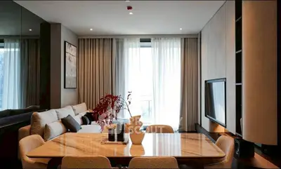 Luxurious modern living room with elegant dining area and stylish decor