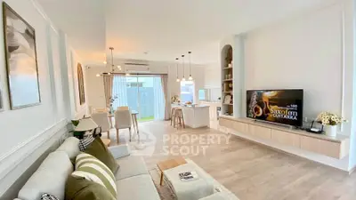 Spacious modern living room with open kitchen and stylish decor