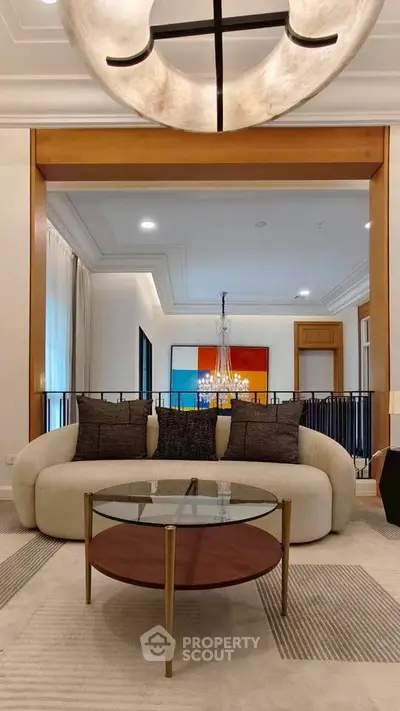 Luxurious living room with modern sofa and elegant chandelier
