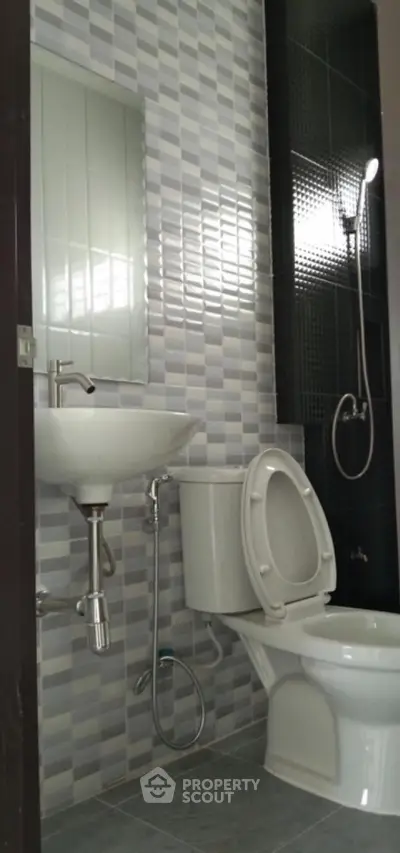 Modern bathroom with stylish tiles and sleek fixtures