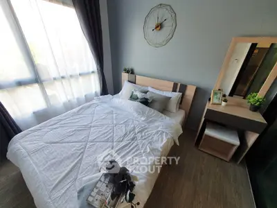 Cozy bedroom with modern decor and natural light