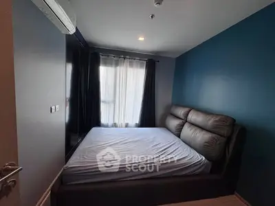 Cozy bedroom with modern design and ample natural light