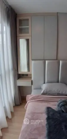 Cozy modern bedroom with plush bedding and natural light