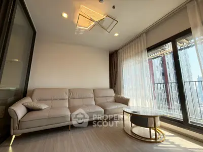 Modern living room with elegant sofa and city view balcony