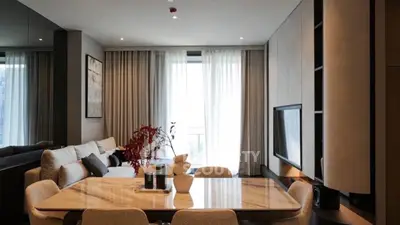 Luxurious modern living room with elegant dining area and stylish decor