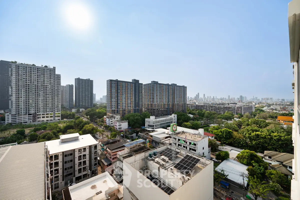 Stunning urban skyline view from high-rise apartment balcony