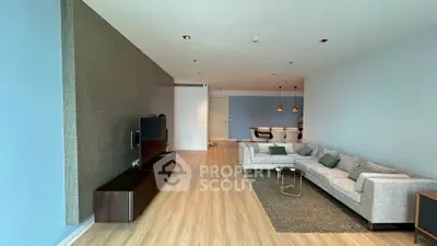 Spacious modern living room with stylish decor and cozy seating area