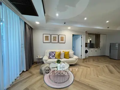 Spacious modern living room with elegant decor and natural light