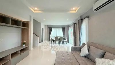 Spacious modern living room with elegant dining area and stylish decor
