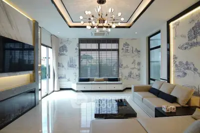 Luxurious living room with elegant chandelier and modern decor