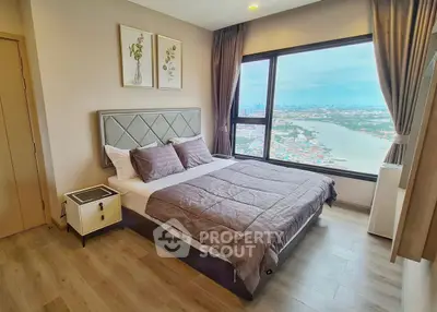 Modern bedroom with stunning river view and elegant decor