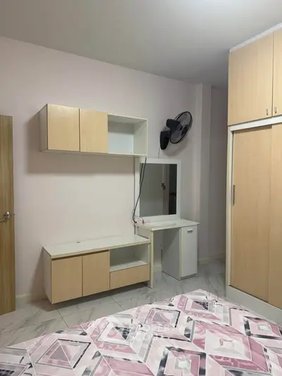 Cozy bedroom with modern furniture and soft pink accents