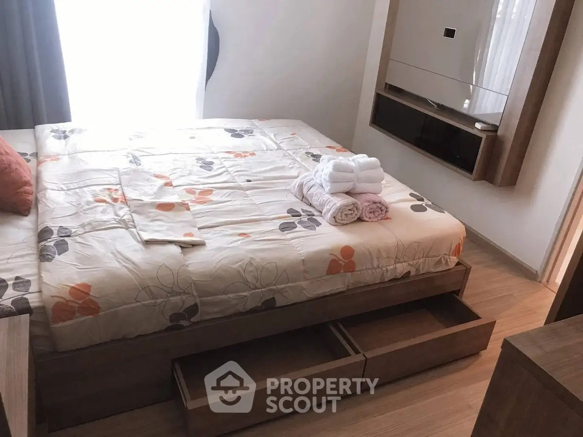 Cozy bedroom with modern design and ample storage space