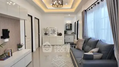 Elegant living room with modern decor and cozy seating area