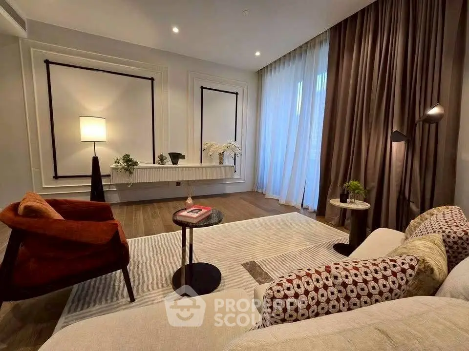 Luxurious modern living room with elegant decor and cozy seating area.