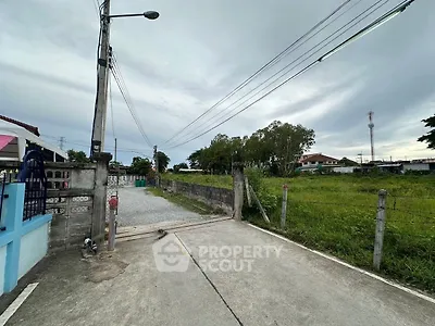 Spacious plot of land with potential for development in a serene neighborhood.