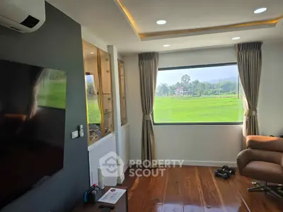 Stunning living room with panoramic countryside view and modern decor