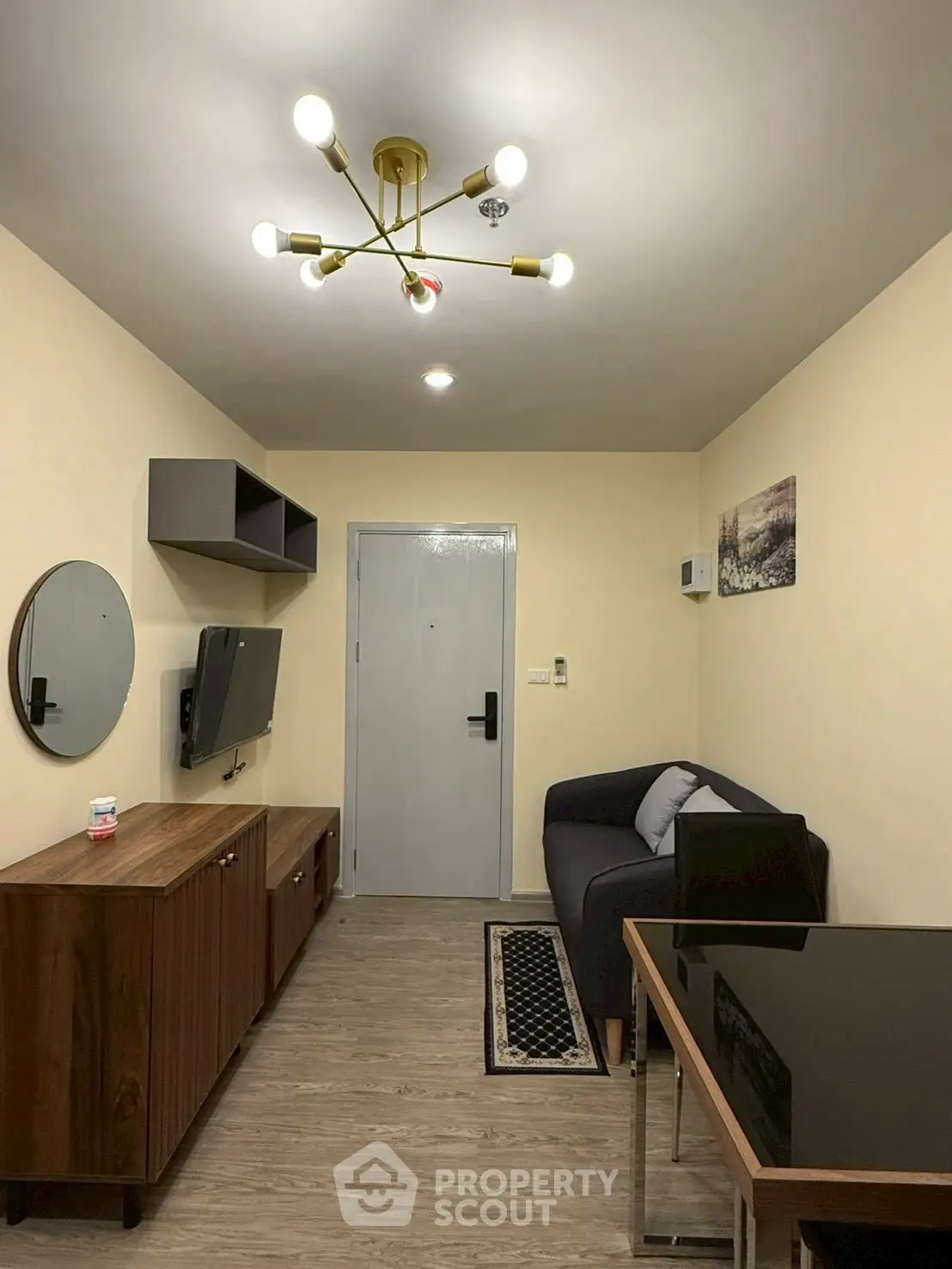 Cozy modern living room with stylish furniture and elegant lighting