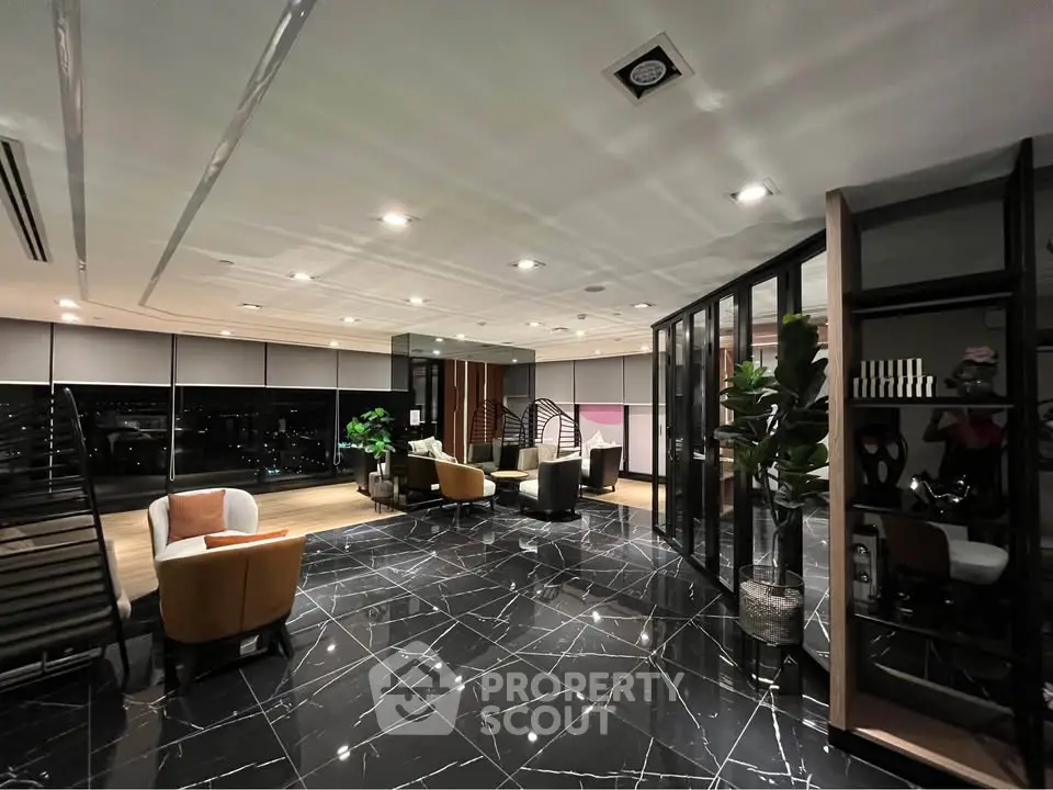 Luxurious modern living room with elegant black marble flooring and stylish furniture