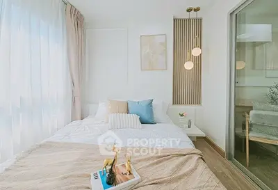 Bright and cozy bedroom with modern decor and large window
