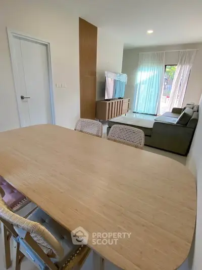 Modern living room with stylish furniture and natural light