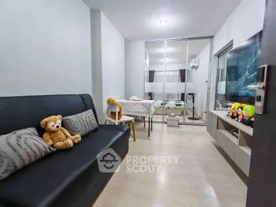 Modern living room with sleek furniture and cozy decor, perfect for relaxation and entertainment.