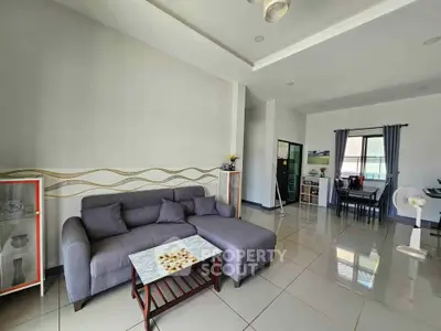 Spacious modern living room with elegant gray sofa and stylish decor