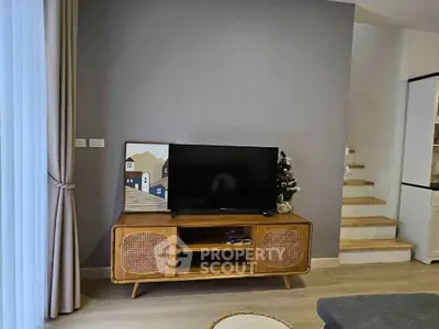 Stylish living room with modern TV stand and cozy decor
