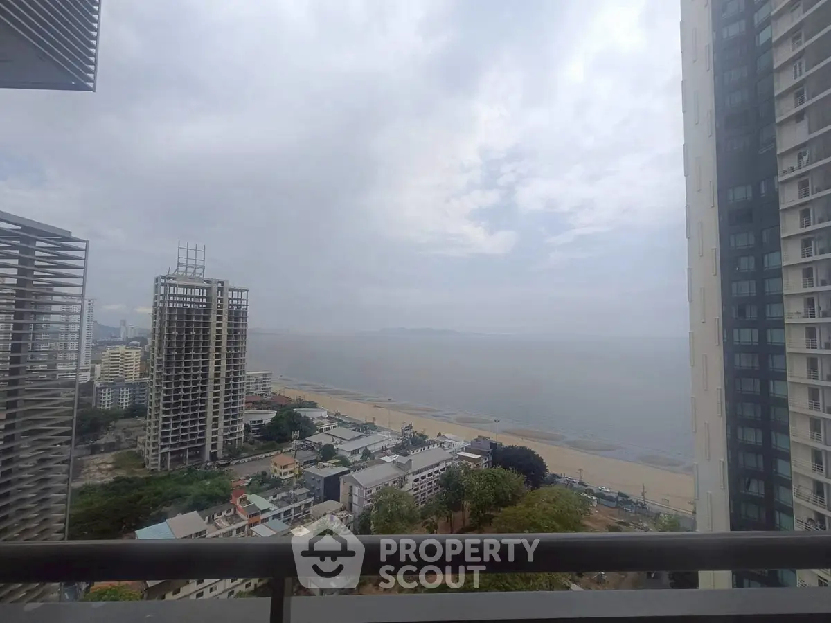 Stunning high-rise ocean view from a modern balcony, perfect for coastal living.