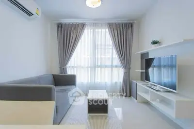 Bright and modern living room with large window and stylish furniture
