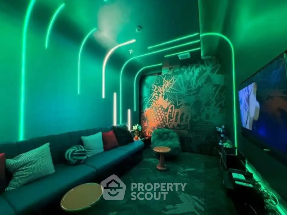 Modern living room with neon lighting and stylish decor, perfect for entertainment and relaxation.